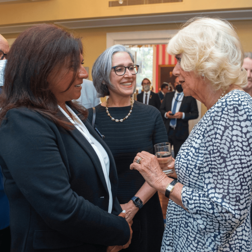 Dr. Famida Jiwa and Jeannette Briggs speaking with Her Royal Highness The Duchess of Cornwall