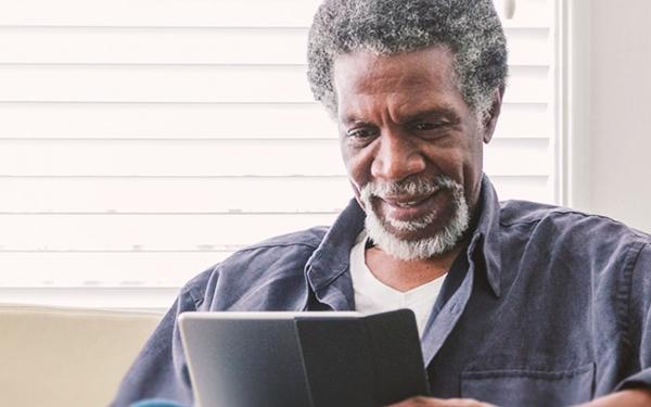 Man looking at a tablet