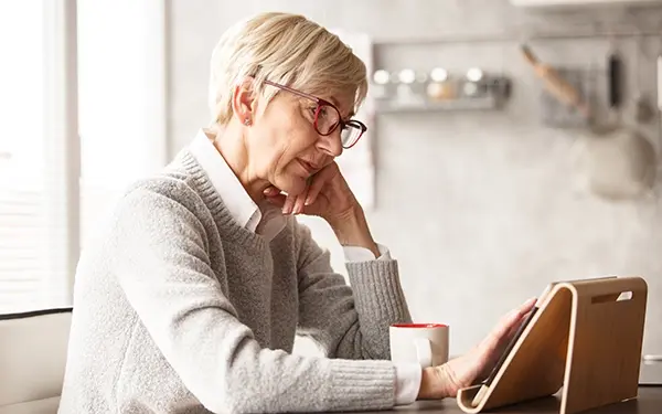 Woman Reading tablet