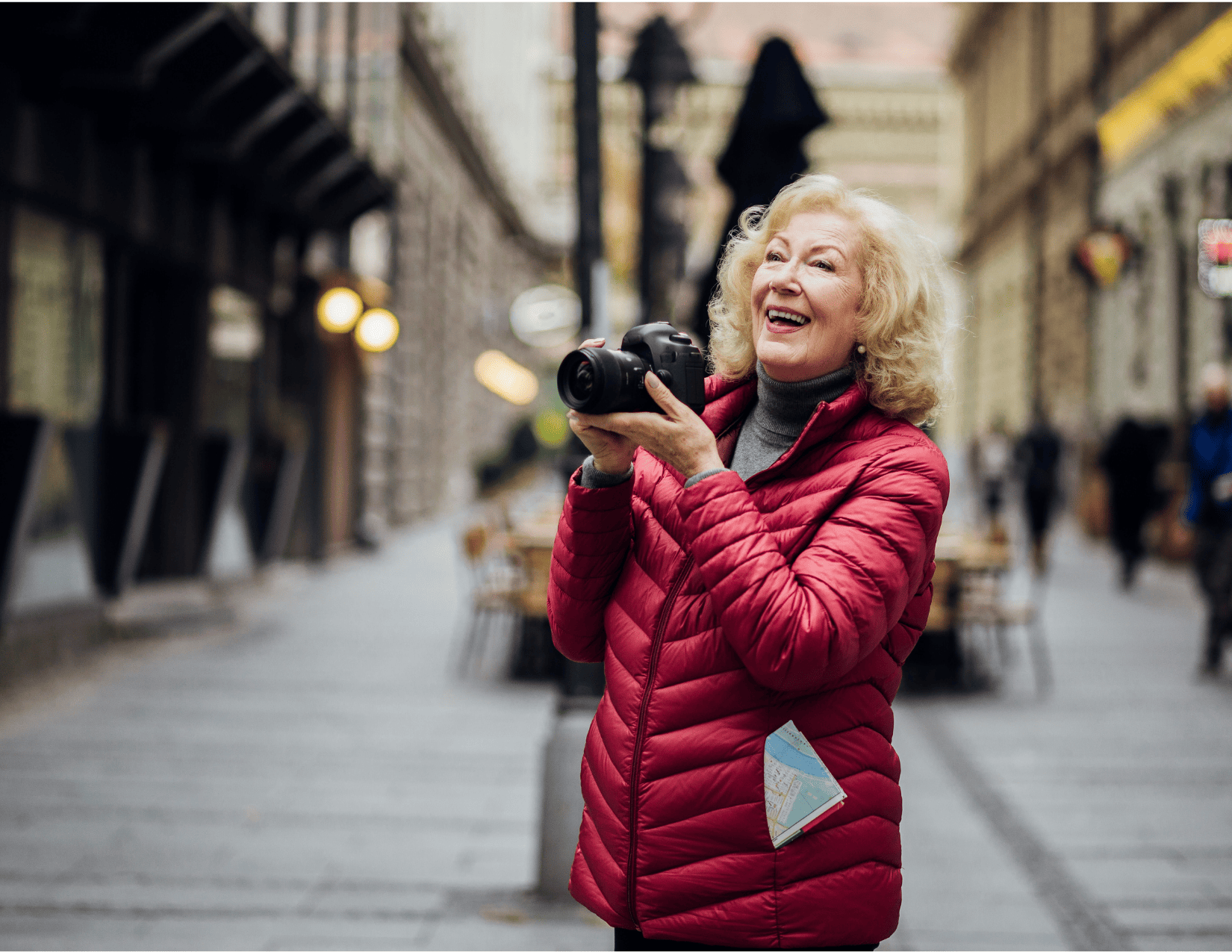 Older woman travelling with a camera